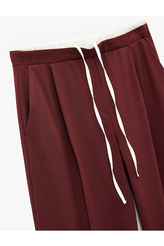 Koton Cepli Pile Detaylı Beli Bağcıklı Geniş Paça Kumaş Pantolon Bordo 6wak40185pw Bordo