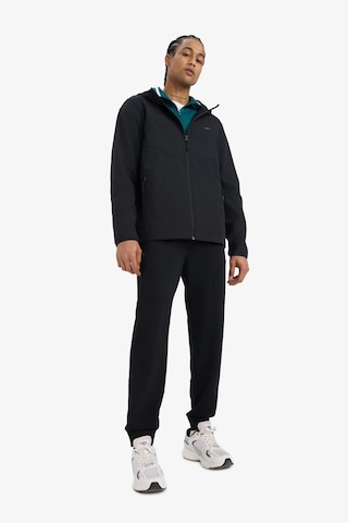 Defacto Defactofit Su İtici Regular Fit Kapüşonlu Fermuarlı Softshell Yağmurluk A2122ax25aubk81 Siyah