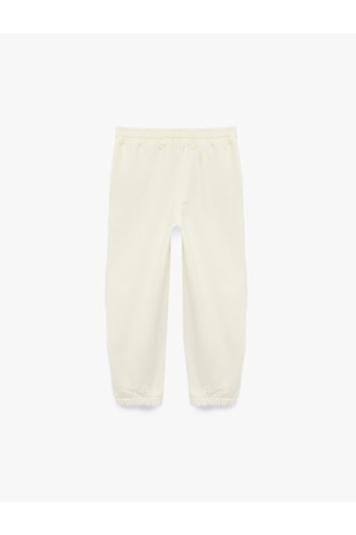 Koton Cep Detaylı Lastikli Oversize Jogger Eşofman Altı Ekru 7wmb40044tk