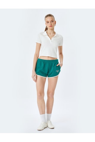 Koton Cep Detaylı Beli Lastikli Slogan Baskılı Biyeli Slim Fit Mini Şort Yeşil 5sal40062ık Yeşil