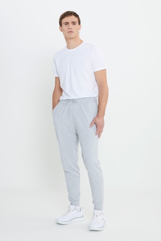 AC&Co / Altınyıldız Classics Standart Fit Normal Kesim Pamuklu Baskılı Cepli Erkek Eşofman Altı Gri Melanj