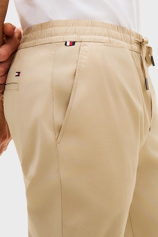 Tommy Hilfiger Pamuklu Bağlamalı Normal Bel Düz Paça Pantolon Erkek Pantolon Mw0mw42340 Rbt Kum