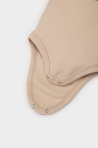 DeFacto Erkek Bebek Yenidoğan Bisiklet Yaka Baskılı Uzun Kollu Çıtçıtlı Body E6304A525SPBG287 Bej