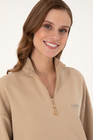 U.S. Polo Assn. Kadın Kum Dik Yaka Fermuarlı Sweatshirt 50297316-VR085