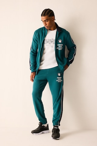 Defacto Nba Boston Celtics Yan Şeritli Standart Fit Dalgıç Kumaş Jogger H7761ax26augn1020 Yeşil-gn1020