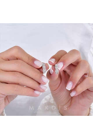 0.55 Karat Pırlanta Küpe - Hrd Sertifikalı