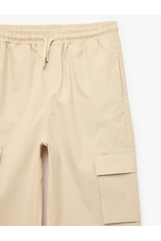 Koton Pamuklu Kapaklı Cep Detaylı Beli Bağcıklı Oversize Jogger Pantolon Bej 6skb40069tw Ekru