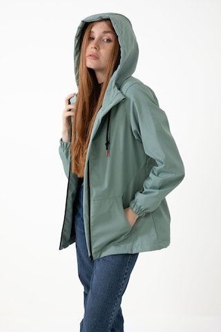 Kadın Mint Yeşil Içi Astarlı Su Geçirmez Ve Rüzgara Dayanıklı Kapüşonlu Cepli Yağmurluk - Rüzgarlık Mint Yeşil Mint Yeşili