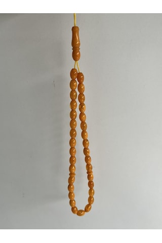 Oval Kesim Kokulu Toz Kehribar Tesbih 33lük 7mm A007