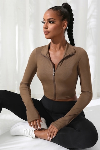 İmoda Kadın Kahverengi Uzun Kol Fermuarlı Parmak Geçme Detaylı Dik Yaka Crop Top Bluz Kahverengi