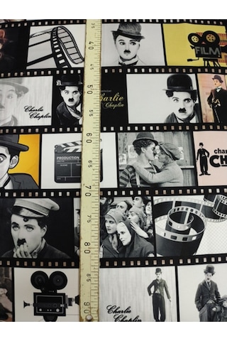 Film Şeridi Içende Charlie Chaplin Desenli Kumaş