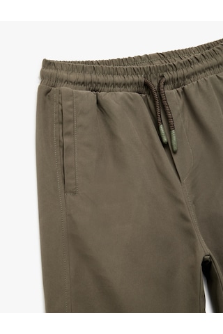 Koton Cepli Beli Lastikli Bağlamalı Loose Fit Jogger Paraşüt Pantolon Yeşil 6wkb40018tw Yeşil