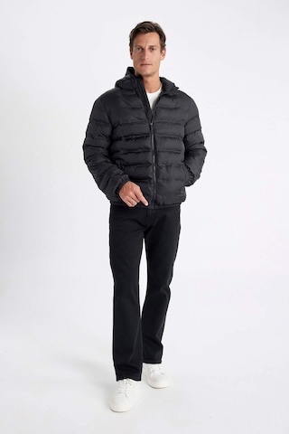 DeFacto Su İtici Şişme Mont Slim Fit Dar Kesim Kapüşonlu Fermuarlı Cepli D1185AX24WNBK27