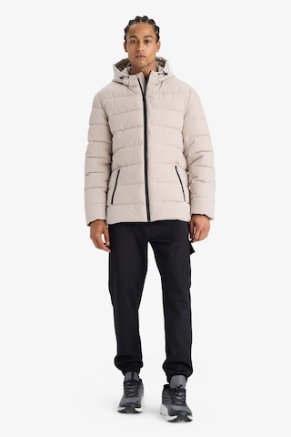 Defacto Su İtici Slim Fit Dar Kesim Astarlı Kapüşonlu Fermuarlı Cepli Dolgulu Mont R0216az25aubg766 Bej-bg766