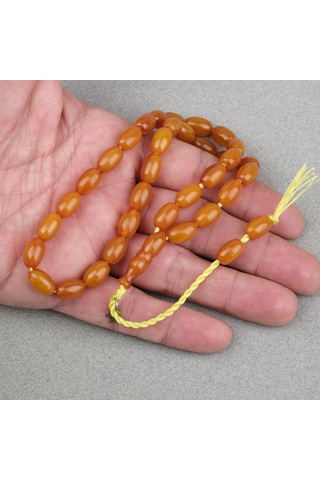 Omari Sıkma Kehribar Beyzi Kesim Sistemli 7.5x12mm Tesbih