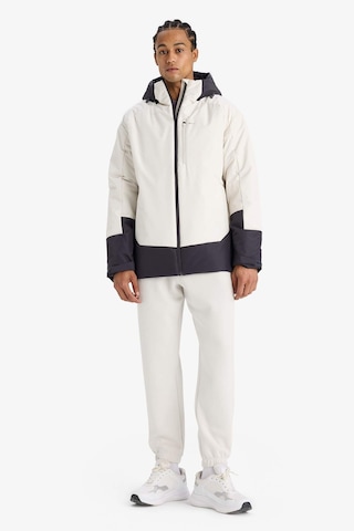 Defacto Defactofit Su İtici Regular Fit Kapüşonlu Fermuarlı Su Geçirmez Mont E9494ax25aubg715 Bej