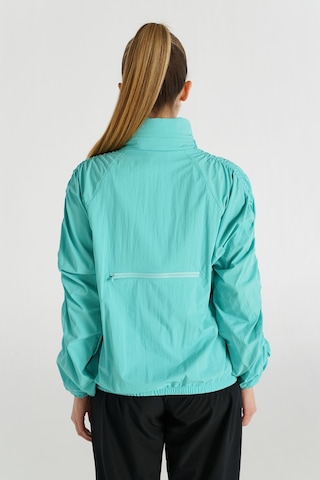 Hummel Berry Yağmurluk 940265-9951 Yeşil