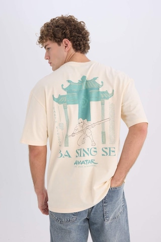 DeFacto Avatar the Last Airbender Boxy Fit Bisiklet Yaka Sırt Baskılı Kısa Kollu Tişört D6776AX25SPER83 Ekru