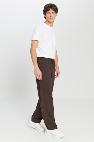 AC&Co / Altınyıldız Classics Erkek Kahverengı Pamuklu Baggy Fit Rahat Kesim Beli Bağlamalı Yan Cepli Örme Eşofman Altı Kahverengi