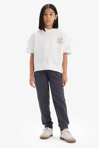 DeFacto Kız Çocuk Oversize Geniş Kalıp Bisiklet Yaka Kısa Kollu Baskılı Sweatshirt E1879A825SMER85 Ekru
