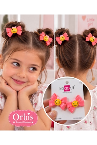 Orbis Tarzın Dünyası Pembe Fiyonklu Gülen Yüz Figürlü Kız Çocuk Saç Tokası 2 Li Set