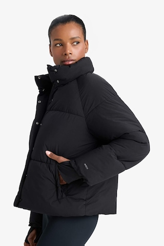 Defacto Defactofit Su Geçirmez Regular Fit Dik Yaka Reglan Kol Kışlık Şişme Mont A1550ax25wnbk81 Siyah