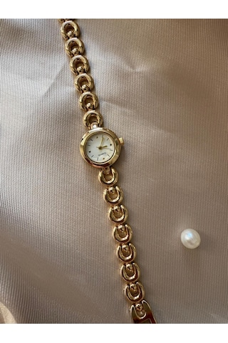 Retro Minimal Boncuk Kordon Vintage Kadın Kol Saati Yuvarlak Altın