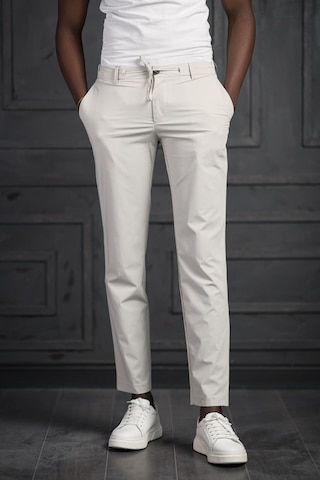 Beli Lastikli Ve İplikli Likralı Yazlık İnce Paraşüt Kumaş Jogger Pantolon Krem