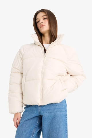 Defacto Su Geçirmez Regular Fit Dik Yaka Fermuarlı Şişme Mont E8690AX25AUER128 Ekru