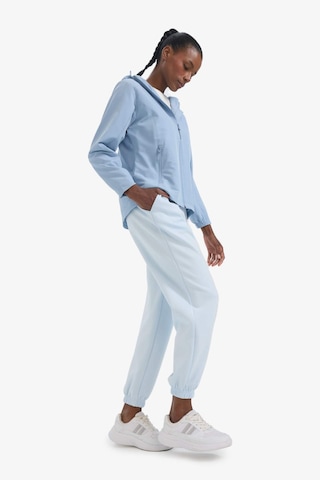 Defacto Defactofit Su İtici Regular Fit Kapüşonlu Fermuarlı İpek Kumaş Yağmurluk C4952ax25aube748 Mavi