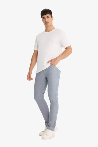 DeFacto Yazlık Chino Kanvas Dokulu Pantolon Slim Fit Dar Kesim Cepli Dar Paça T1055AZ25SPIN87