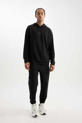 DeFactoFit Standart Fit Kapüşonlu Baskılı Sporcu Sweatshirt D6826AX24AUBK81