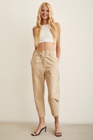 Never More Beli Lastikli Düğme Kapalı Boyfriend Jean Bej
