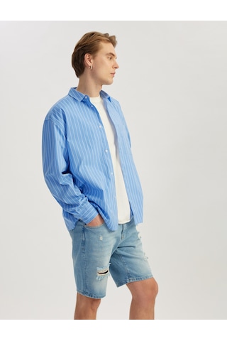 Koton Pamuklu Yırtık Detaylı Bermuda Slim Fit Jean Şort Orta İndigo 5sam40005ıd İndigo