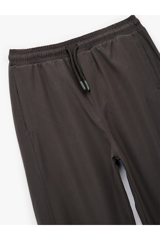 Koton Cepli Beli Lastikli Bağlamalı Loose Fit Jogger Paraşüt Pantolon Antrasit 6wkb40018tw Antrasit