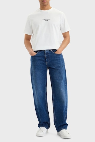 Calvin Klein Logolu Pamuklu Regular Fit Bisiklet Yaka T Shirt Lv04rb824gyaf Erkek T Shirt Lv04rb824g Yaf Beyaz