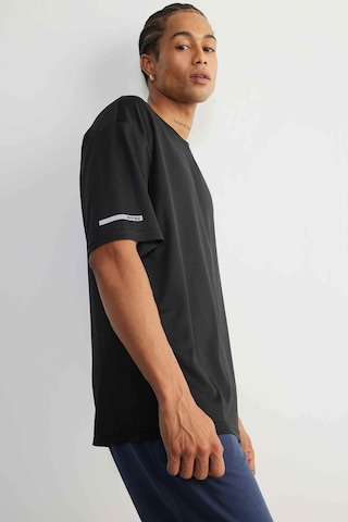 DeFactoFit Hızlı Kuruyan Boxy Fit Bisiklet Yaka Baskılı Sporcu Kısa Kollu Tişört D6726AX25SPBK81