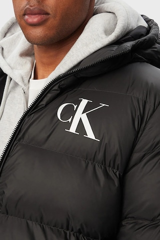 Calvin Klein Logolu Su İtici Kapüşonlu Şişme Mont Lv04rg513gub1 Erkek Mont Lv04rg513g Ub1 Siyah