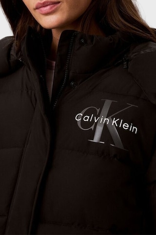 Calvin Klein Kapitoneli Çıkarılabilir Kapüşonlu Şişme Mont Lv047h506gub1 Kadın Mont Lv047h506g Ub1 Siyah