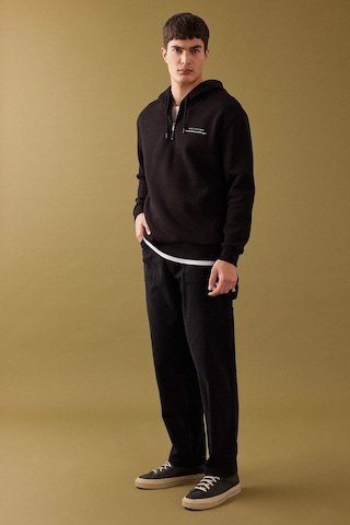 DeFacto Oversize Geniş Kalıp Yarım Fermuarlı Kapüşonlu Sırt Baskılı Sweatshirt B4804AX24SPBK81