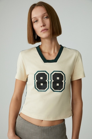 ETHIQUET YEIDY Kadın Slim Baskılı Kısa Kol Asimetrik Yaka Bej T-Shirt