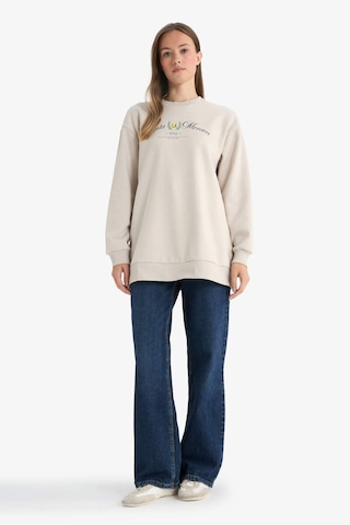 Defacto Regular Fıt Bisiklet Yaka Baskılı İçi Yumuşak Tüylü Sweatshirt Tunik F3088ax25wnbg186 Bej-bg186