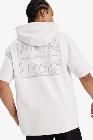 Defacto Defactofit Nba Los Angeles Lakers Boxy Fit Kapüşonlu Sırt Baskılı Kısa Kollu Tişört E8766ax25augr519 Gri
