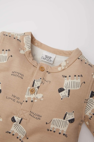 DeFacto Erkek Bebek Yenidoğan Zebra Desenli Uzun Kollu Tulum D4134A524WNBG390 Bej