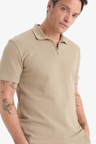 DeFacto Regular Fit Polo Yaka Kısa Kollu Dokulu Tişört E4027AX25SPBG769