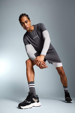 DeFactoFit Slim Fit Dar Kesim Sporcu Taytlı Şort E2760AX25SMAR58