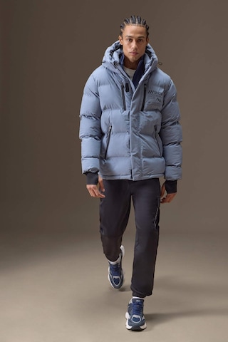 Defacto Su İtici Regular Fit Kapüşonlu Rüzgar Geçirmez Şişme Mont E9485ax25wngr530 Gri-gr530