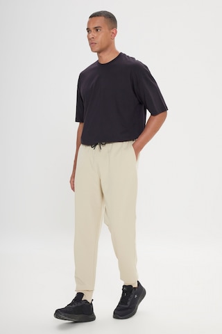 AC&Co / Altınyıldız Classics Erkek Bej Standart Fit Beli Ve Paçası Lastikli Rahat Spor Eşofman Altı Bej
