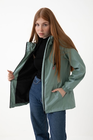Kadın Mint Yeşil Içi Astarlı Su Geçirmez Ve Rüzgara Dayanıklı Kapüşonlu Cepli Yağmurluk - Rüzgarlık Mint Yeşil Mint Yeşili