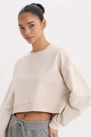 DeFacto Fit Bisiklet Yaka Basic Düz Sporcu Kadın Sweatshirt - Bej D7119AX25SPBG700